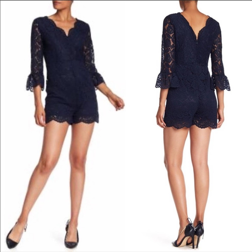 NSR navy lace romper with ruffle cuffs